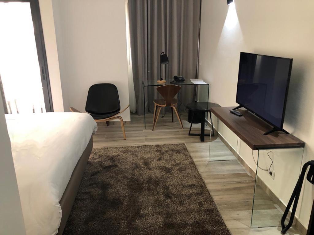Hotel L'Adresse Дакар Экстерьер фото