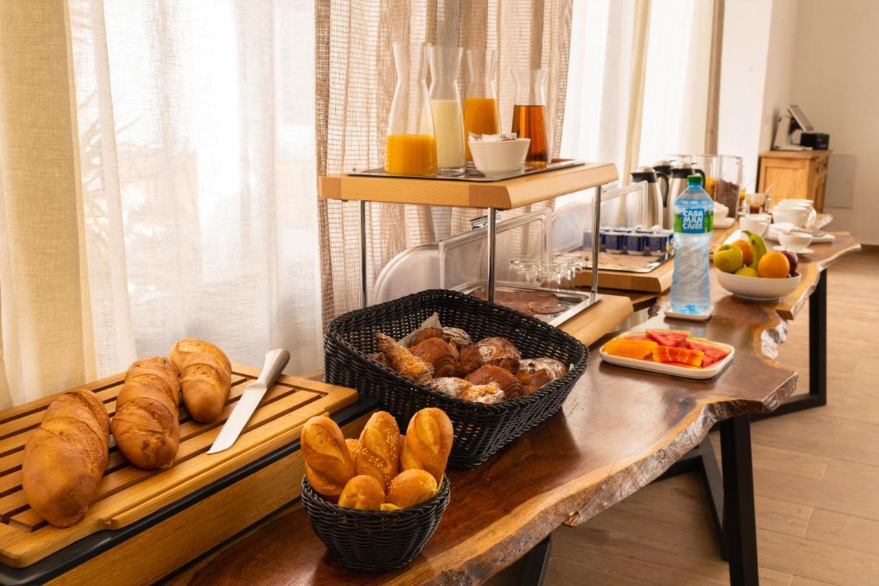 Hotel L'Adresse Дакар Экстерьер фото